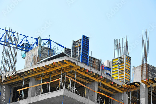 Crane and highrise construction site © Unkas Photo