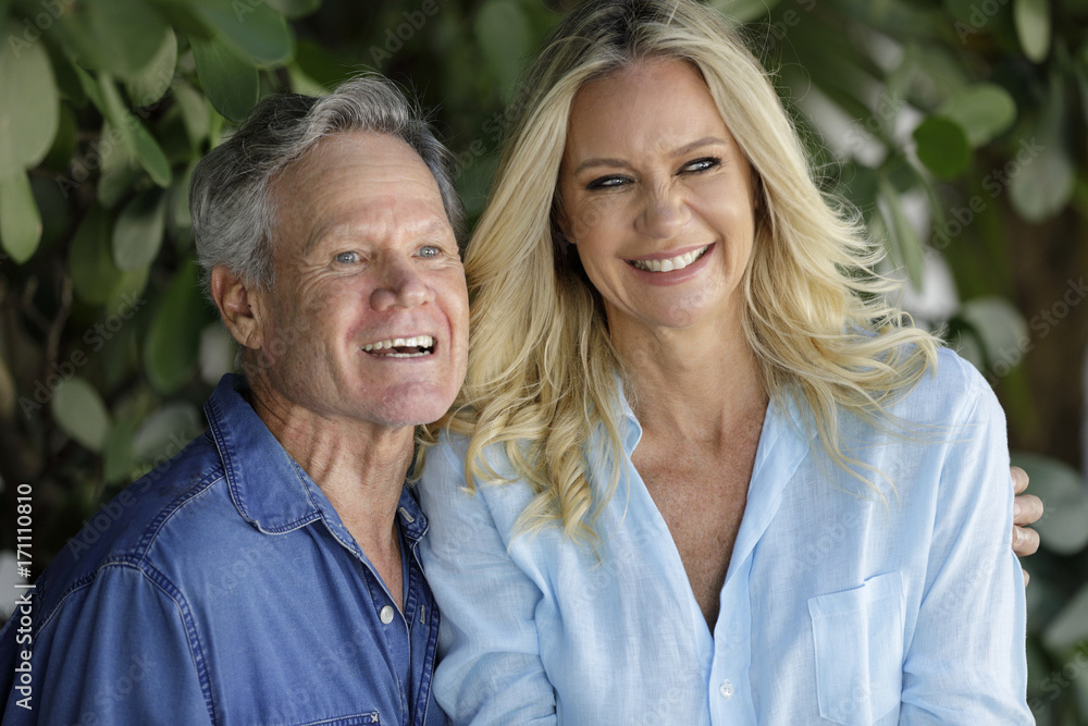 Portrait of a happy mature couple smiling Portrait of a happy mature couple smiling