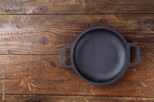 Portioned cast-iron frying pan