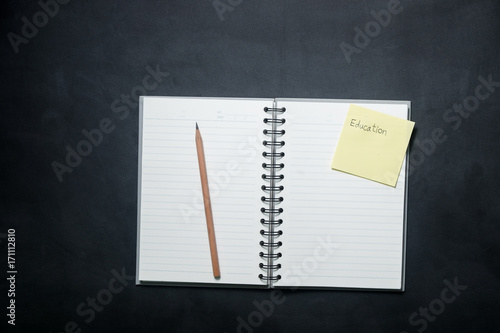 School equipment and supplies for work on a black background., Education concept., Top view.