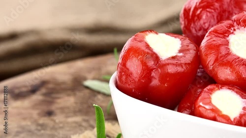 Homemade Filled Red Peppers (with Cheese) (rotating) as detailed 4K UHD footage (seamless loopable)