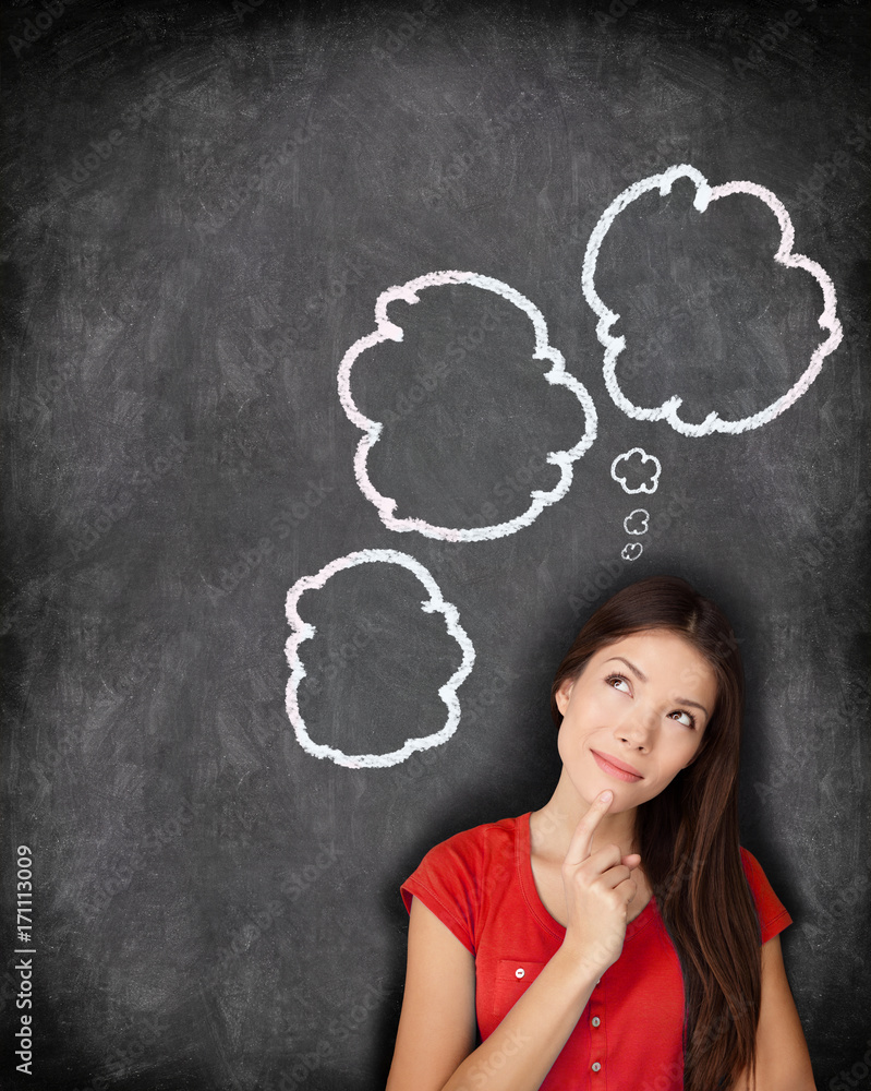 Think bubble student woman thinking of choice options. Three thought drawing bubbles on blackboard concept. Black chalkboard texture background. Mixed race Asian Chinese / Caucasian person.