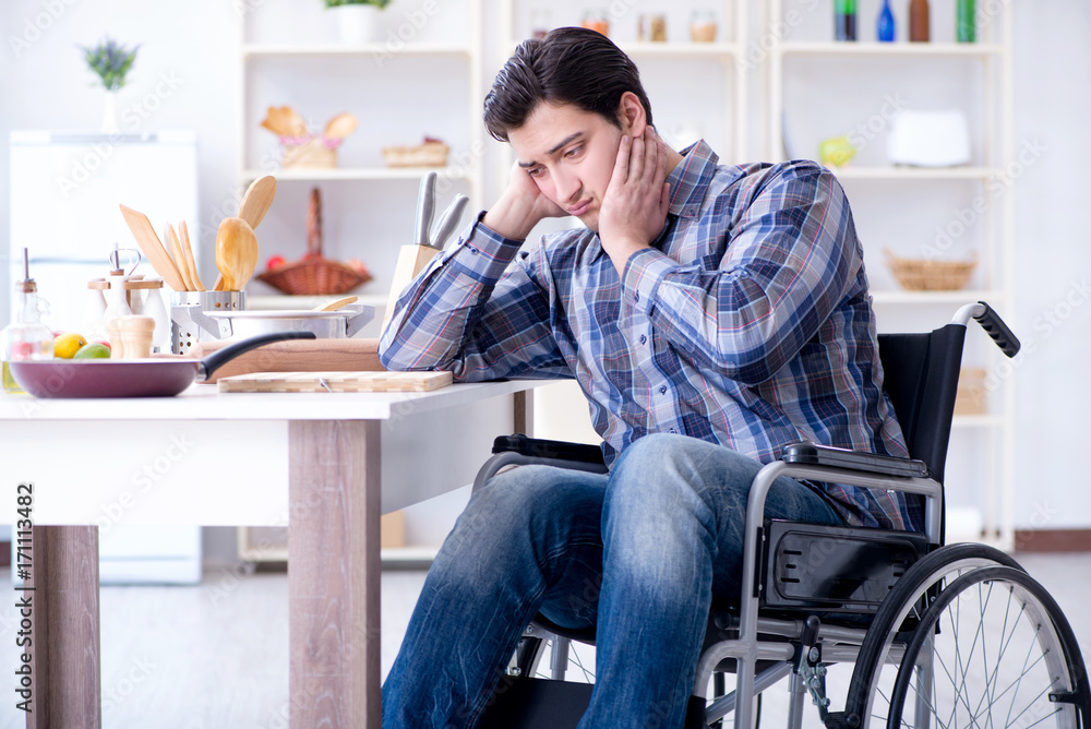 Disabled young man husband working in kitchen Disabled young man husband working in kitchen