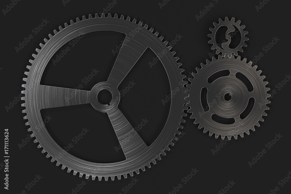Set of metal gears and cogs on black background Set of metal gears and cogs on black background