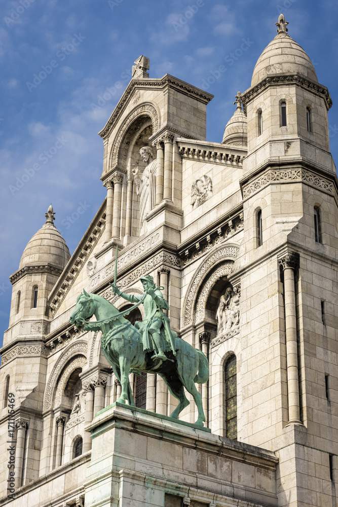 Fototapeta premium Paris, France - April 17, 2015: Joan of Arc statue at basilica Sacre Coeur in Montmartre
