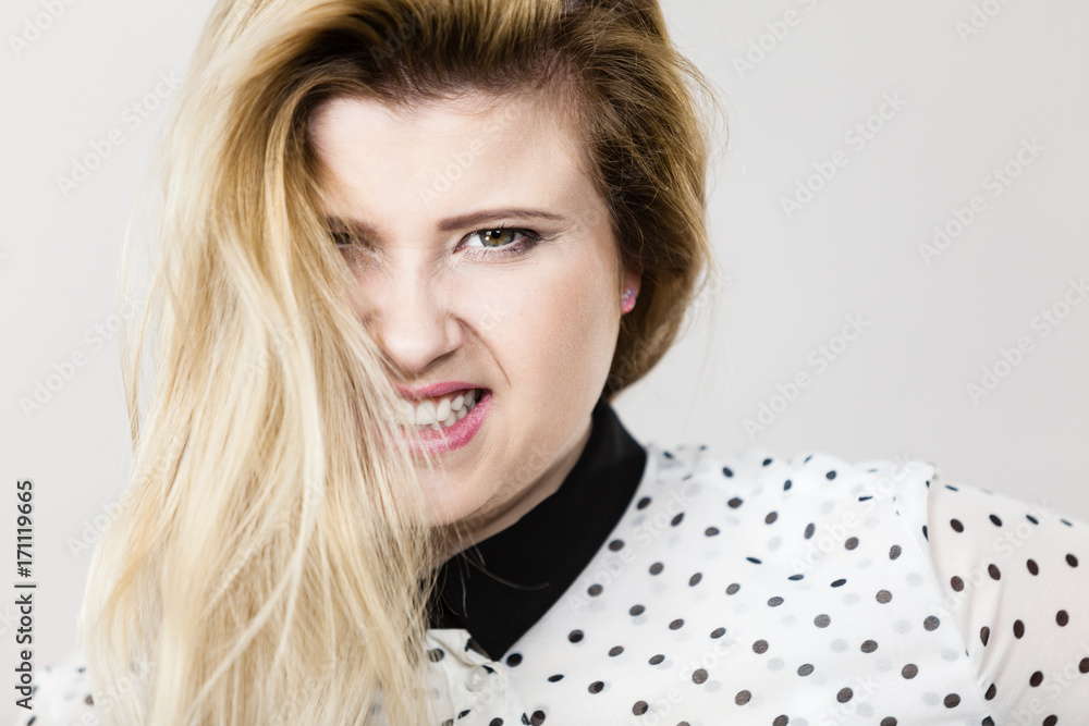 Naklejka premium Angry mad bossy businesswoman being furious