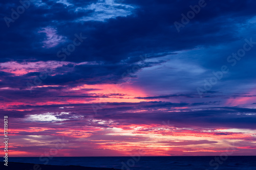 Dramatic cloudscape at sunrise or sunset © htpix