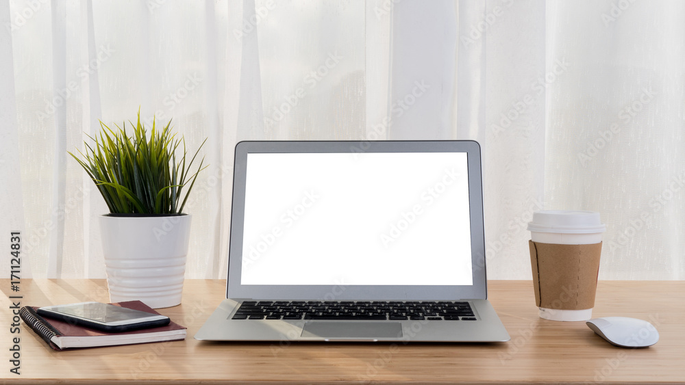 Laptop with smart phone notebook and coffee cup on workplace table. Laptop with smart phone notebook and coffee cup on workplace table.