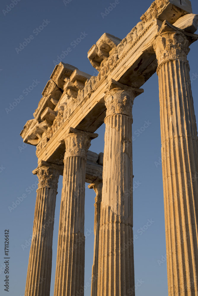 Temple of Apollo with a beautiful sunset background, in Side, Antalya, Turkey.
