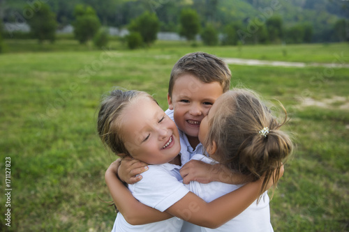 Happy kids. Emotions, hugs, real childhood friendship.