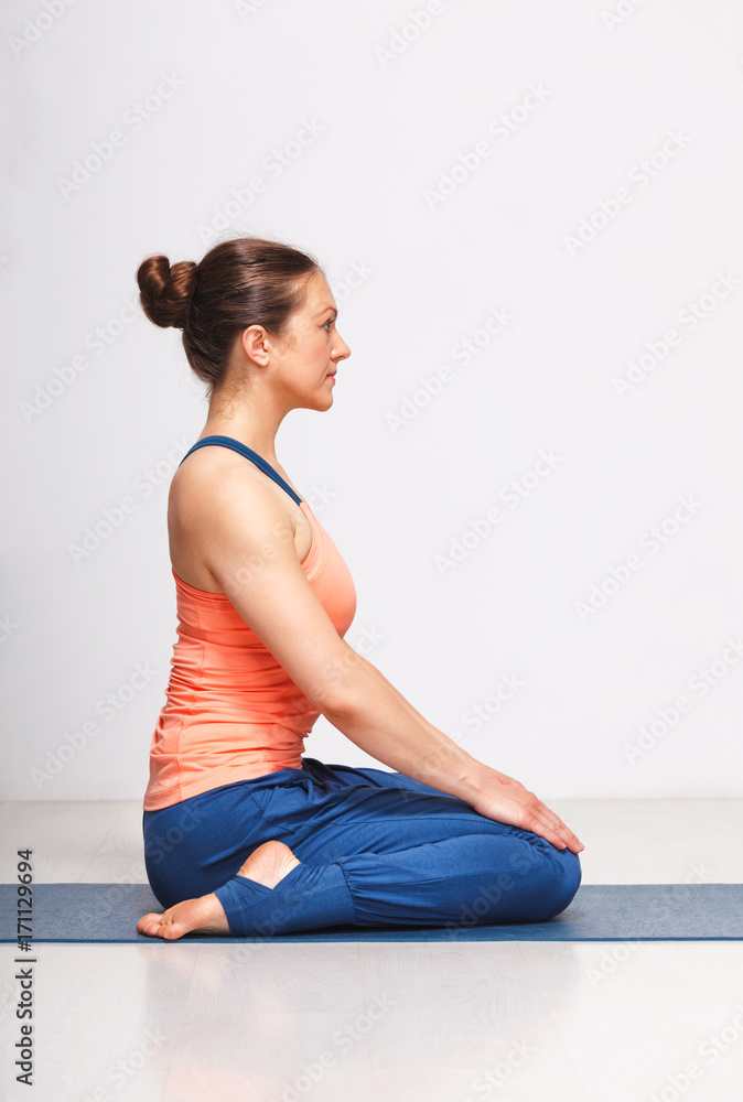 Fototapeta premium Woman in Hatha yoga asana Vajrasana