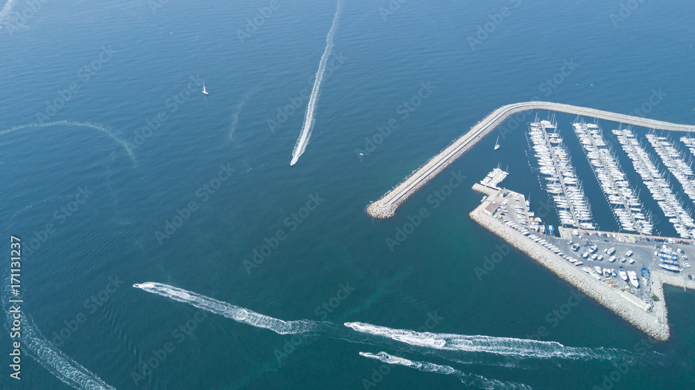 Fototapeta premium Aerial top view of boats and yachts in modern marina from above, Mediterranean sea, South France 