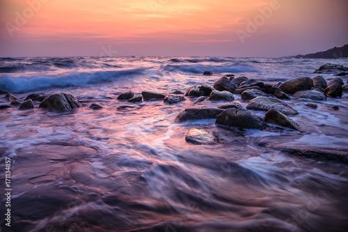 sea scape sunset still water  © chalerpr