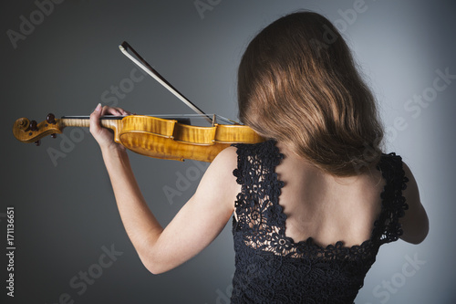 Portrait of a girl playing the violin