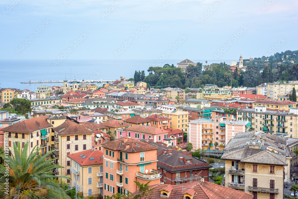 Beautiful sunset view to Santa Margherita Ligure city, blue sky and sea in Italy