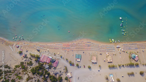 August 2017: Aerial drone photo of famous Tsabika monastery overlooking iconic Tsabika bay from the cliff with clear turquoise waters, Rhodes island, Aegean, Dodecanese, Greece photo