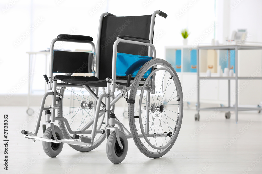 Wheelchair in light room. Elderly care concept
