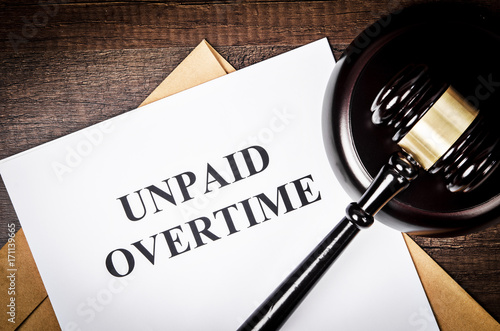 Unpaid Overtime title On Legal Documents. photo