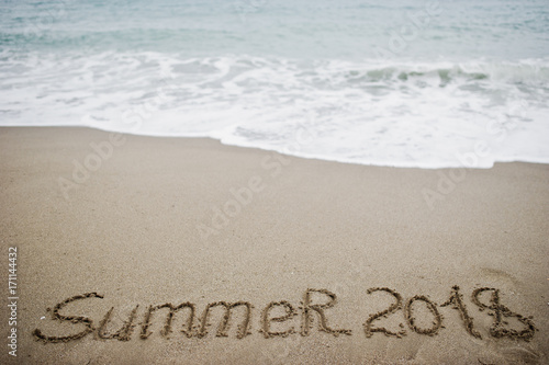 Summer 2018. New Year 2018 is coming concept. Sea and sand.