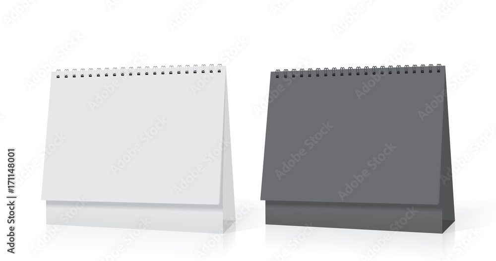 A white paper calendar stands on the table A white paper calendar stands on the table