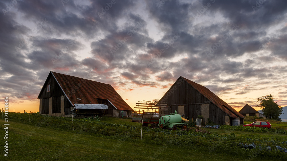 Obraz premium Traditional barns on the edge of a village in northern Slovakia. 