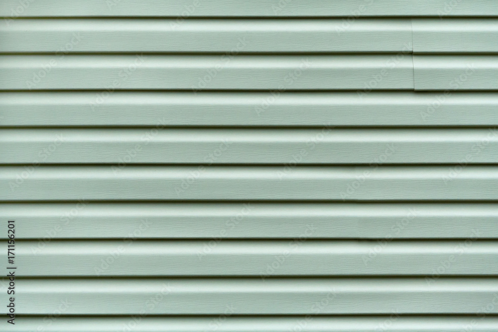 Metallic rippled surface (texture, background) Metallic rippled surface (texture, background)