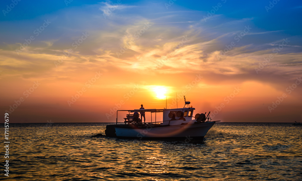 boat at  sunset