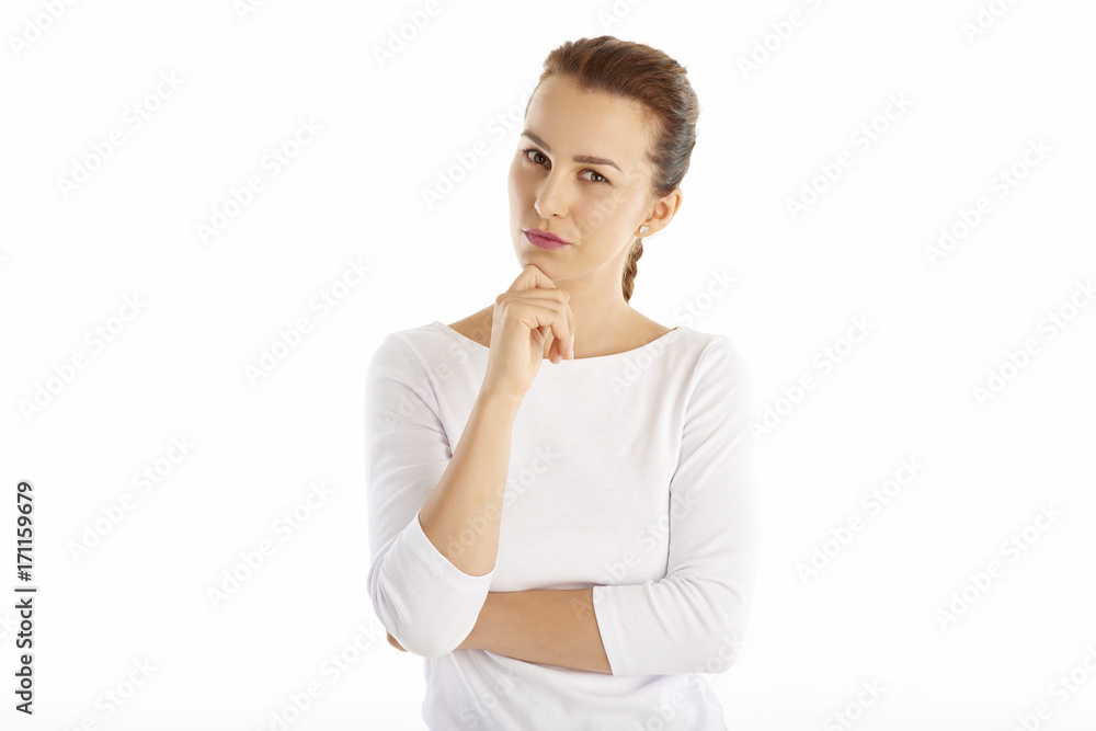 Confident young woman standing at isolated white background. Confident young woman standing at isolated white background.