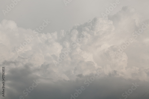the grey sky coming up to storm season of sad nature