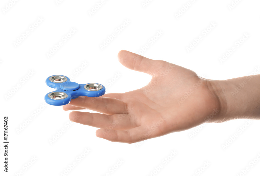 Man rolling modern spinner, isolated on white