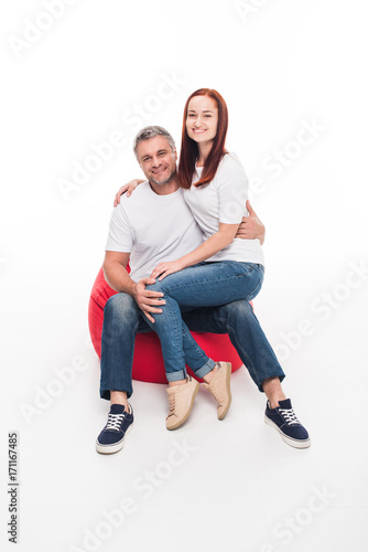 couple in bean bag chair