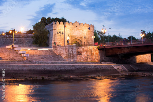 Nis fortress entrance across the bridge on Nisava river in Serbia photo