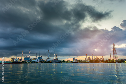  Oil Refinery Industry Plant in Bangkok, Thailand with cloudy sunrise background. Conventional energy concept.