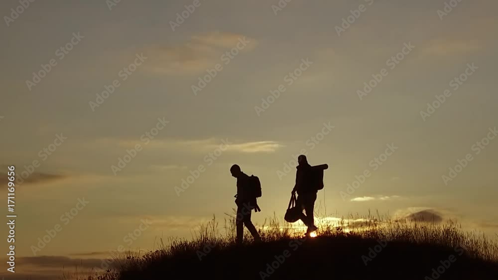 people tourists. people group of tourists walking on top of a travel nature sunset silhouette mountain. slow motion video tourists people group go people tourists. people group of tourists walking on top of a travel nature sunset silhouette mountain. slow motion video tourists people group go