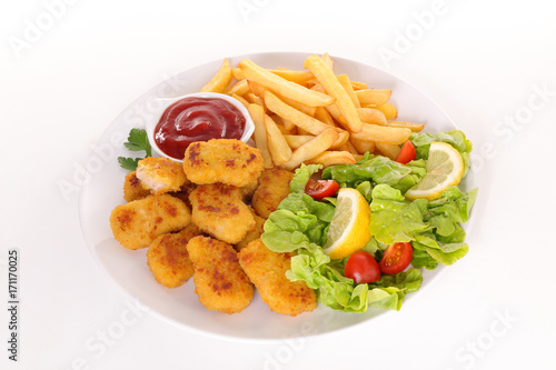 fried chicken nugget with french fries and salad