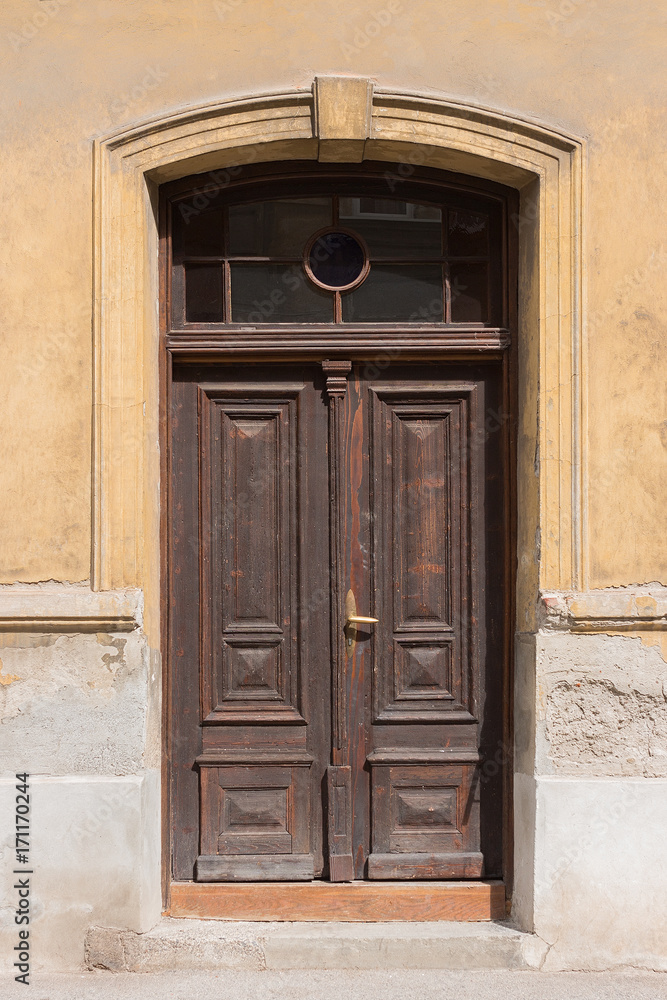 Old brown wooden door