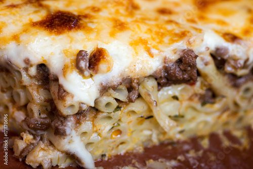 Pastitsio Traditional Greek Baked Pasta Casserole With Ground Beef, Tomatoes, Feta Cheese and Bechamel Sauce