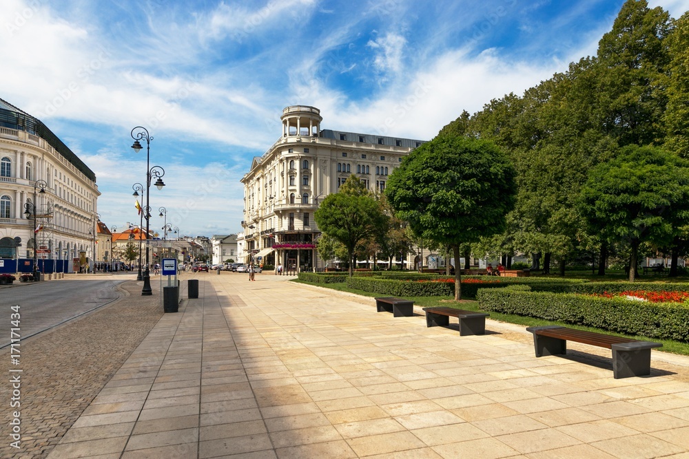 Fototapeta premium Warsaw, Poland - August 2, 2017: Architecture and people on the street New World in Warsaw.