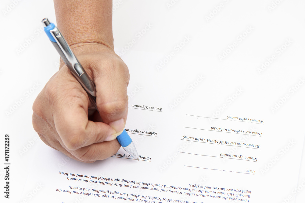 close up picture of woman hand signing contract close up picture of woman hand signing contract