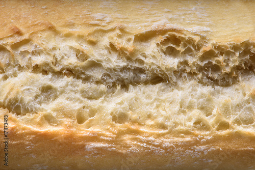 Crust, french baguette texture close up, bakery background.