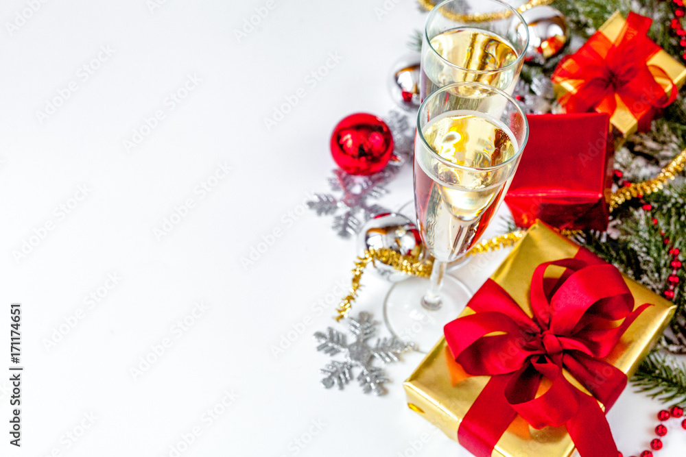 glasses of champagne and Christmas ornaments top view glasses of champagne and Christmas ornaments top view