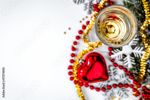 Wallpaper Mural glasses of champagne and Christmas ornaments top view Torontodigital.ca