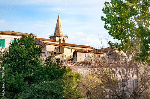 Eglise Saint-Sauveur (Saint Sauveur Church), XIII century, with a six sides pyramidal steeple, guardrails and ogival windows, in Brignoles a little town of Provence in France photo