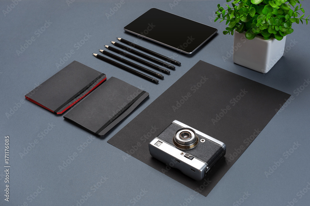 Set of black office stationery on a gray background, flat lay Set of black office stationery on a gray background, flat lay