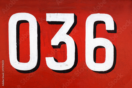 Number 036 against red background