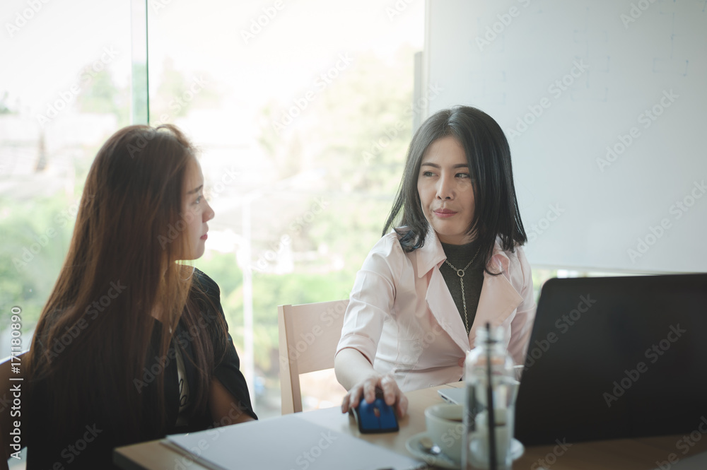 Two women participate business meeting Two women participate business meeting