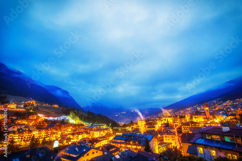 night view of mountain village in alpine valley © Vivida Photo PC