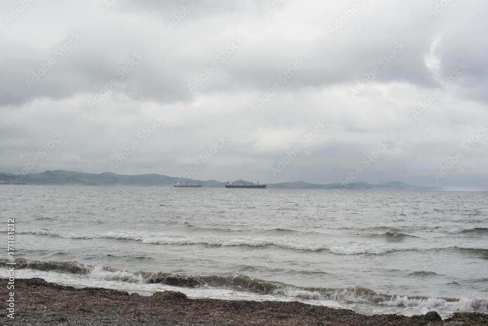 The shore of the sea of Japan in cloudy weather.