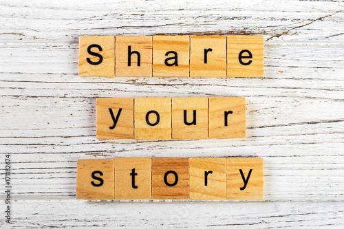 Fotografie share your story word made with wooden blocks concept