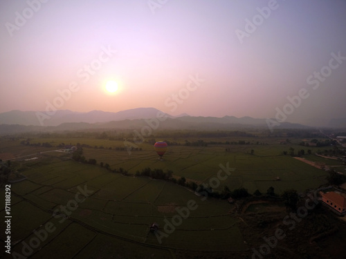 Sunrise Hot Air Balloon Ride in Vang Vieng, Laos photo